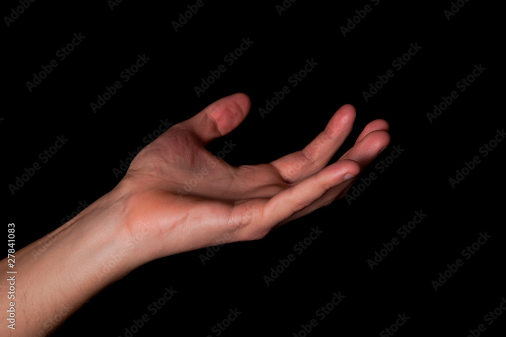 Fototapeta premium Male hand on black background