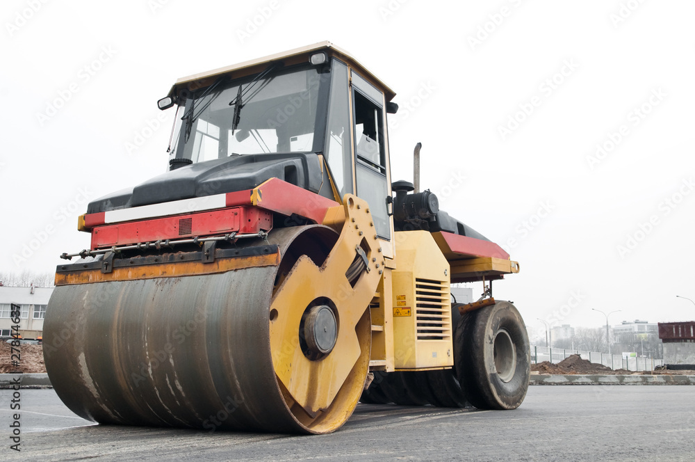 Compactor at asphalt pavement works Compactor at asphalt pavement works