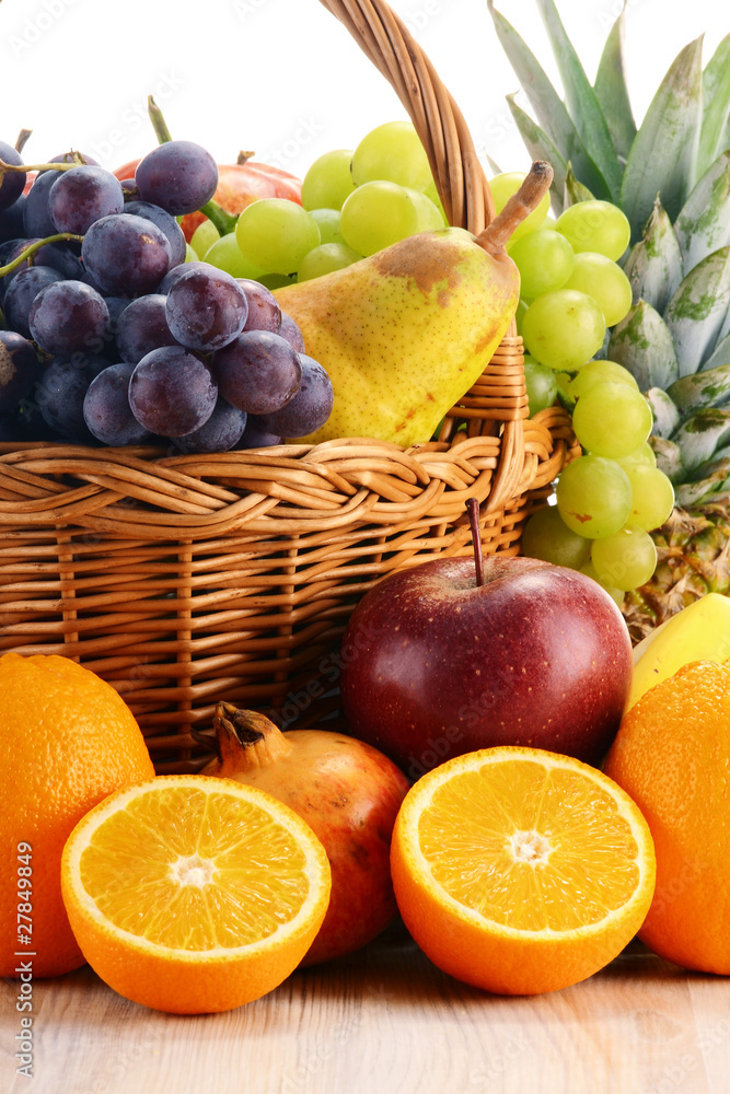 Composition with fruits and wicker basket Composition with fruits and wicker basket