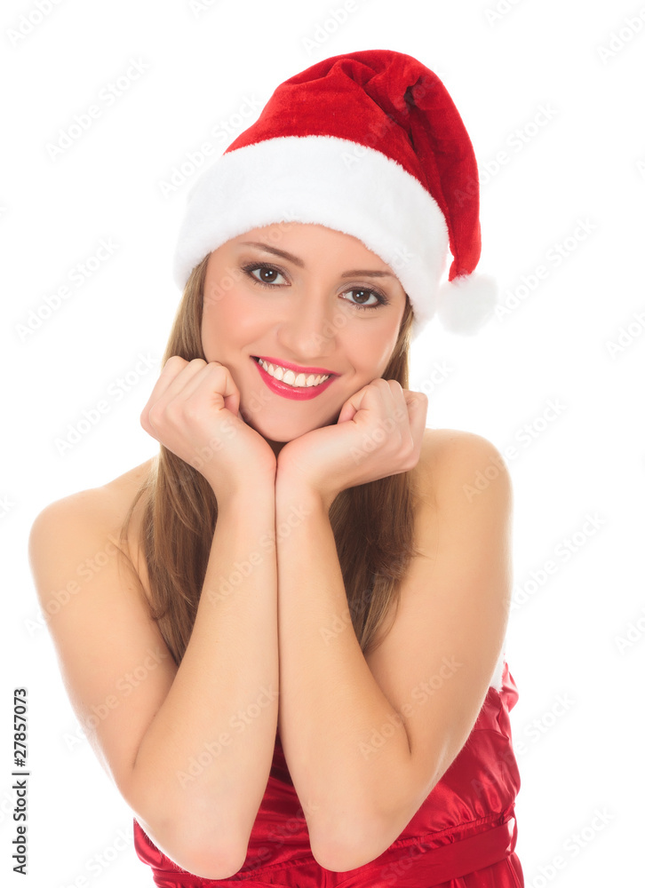 Picture of pretty christmas girl in red dress and santa hat, smi Picture of pretty christmas girl in red dress and santa hat, smi