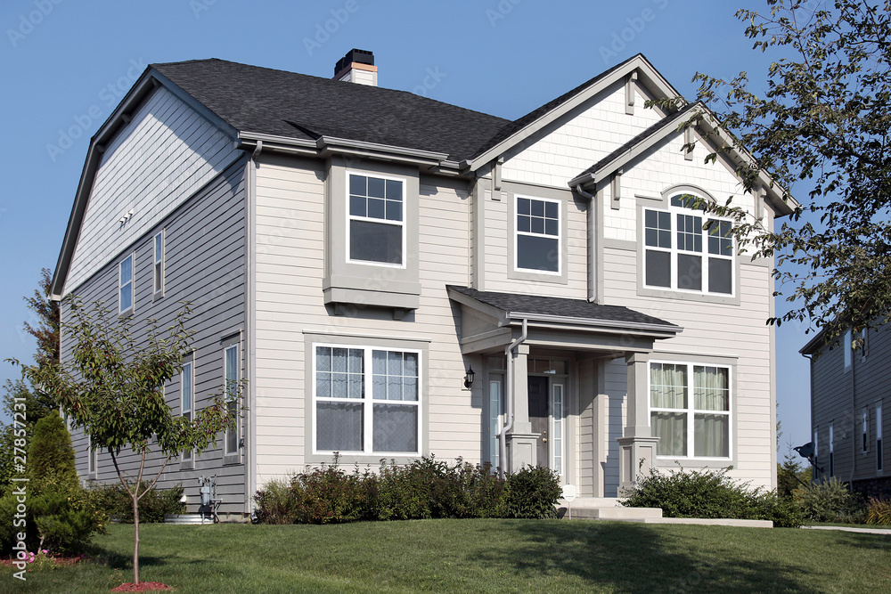 Home with gray and white siding Home with gray and white siding