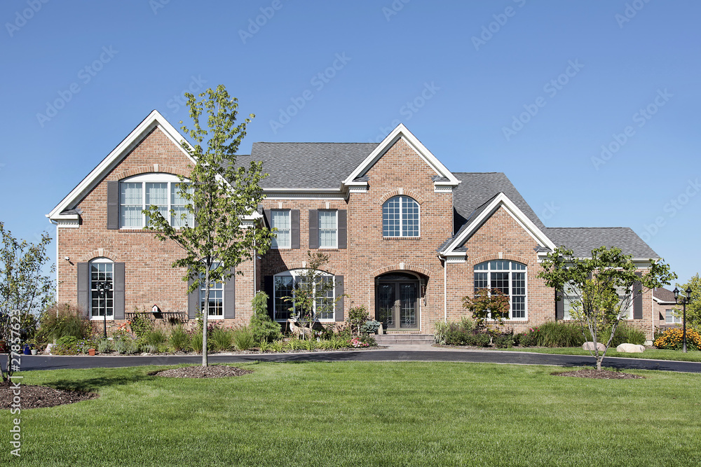 Brick home with arched entry Brick home with arched entry