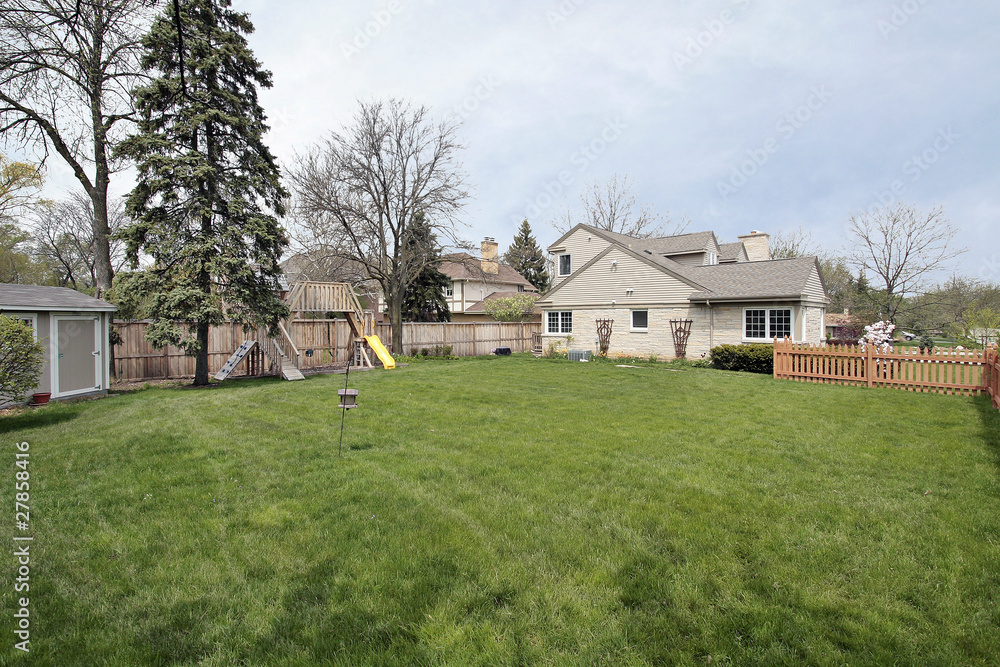Large side yard of suburban home Large side yard of suburban home