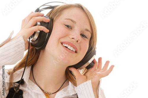Cuadro en lienzo Mädchen hört Musik mit Kopfhörer