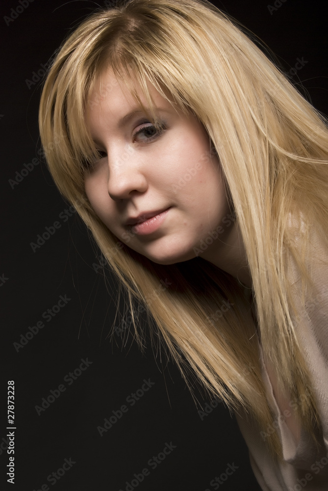 Fototapeta premium Portrait of a young beautiful blonde