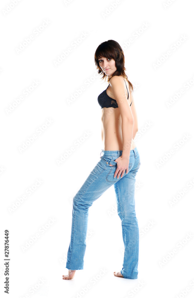 girl in jeans and bra isolated on white girl in jeans and bra isolated on white