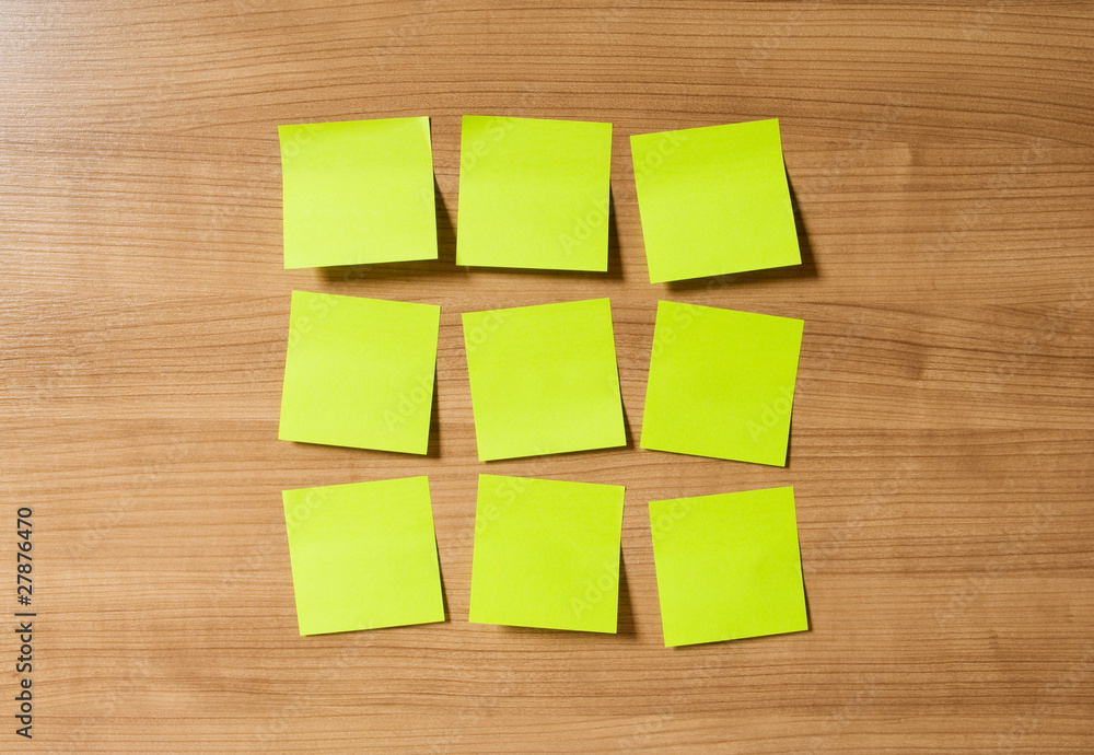 Fototapeta premium Many reminder notes on the wooden background