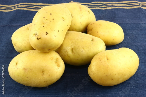 Yukon Gold Potatoes On A Blue Kitchen Towel