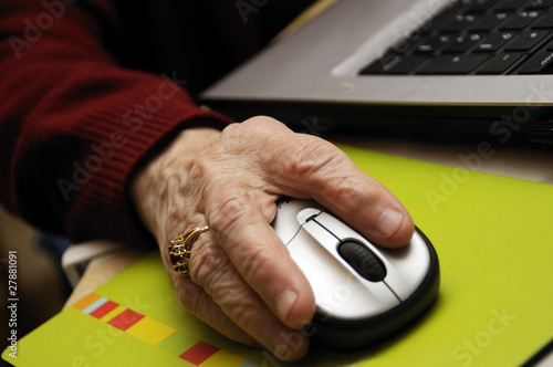 Senior working on computer