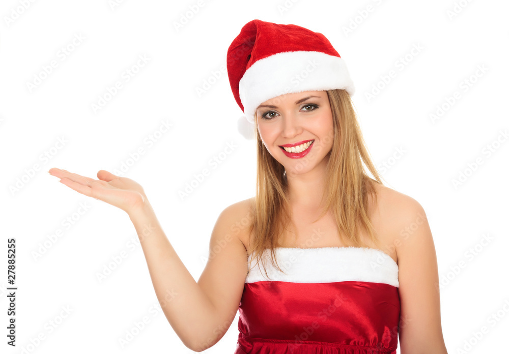 Pretty girl wearing red Christmas hat, holding a hand palm up. Pretty girl wearing red Christmas hat, holding a hand palm up.