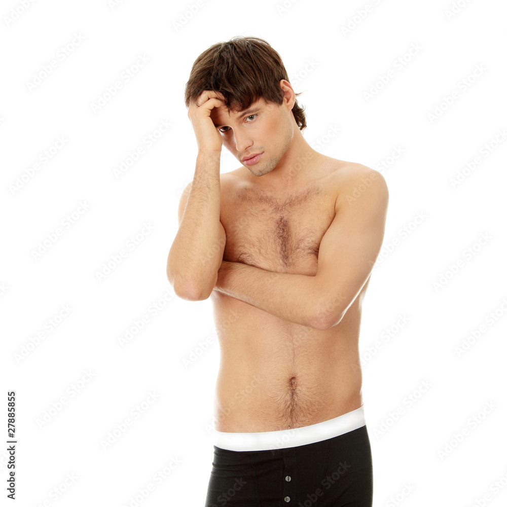 Fototapeta premium Thoughtful young man in underwear.