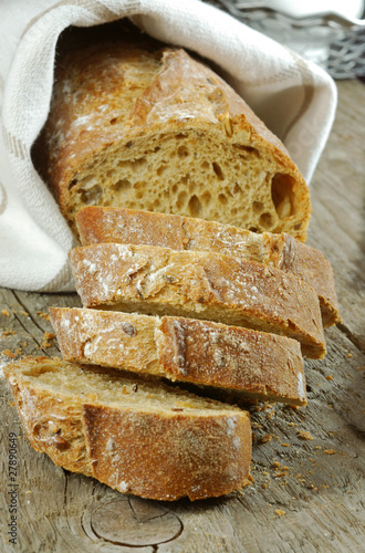 Sliced baguette close up photo