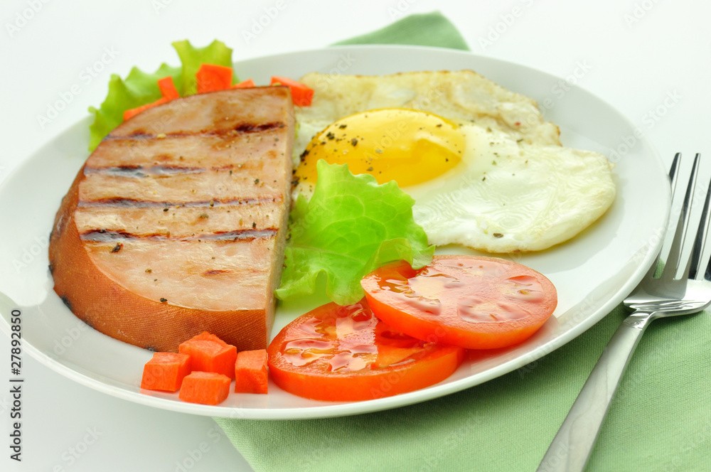 Sliced grilled ham with egg and vegetables Sliced grilled ham with egg and vegetables