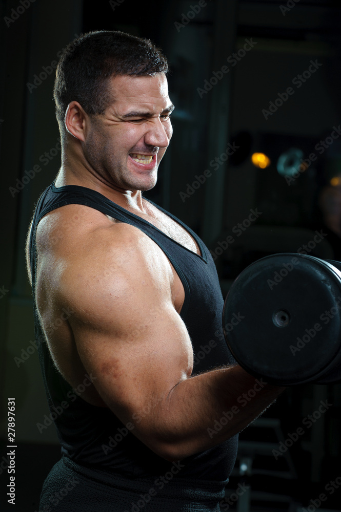Bodybuilder training in gym Bodybuilder training in gym