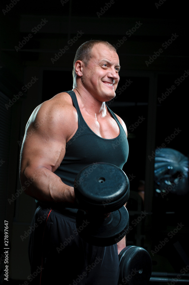 Bodybuilder training in gym Bodybuilder training in gym