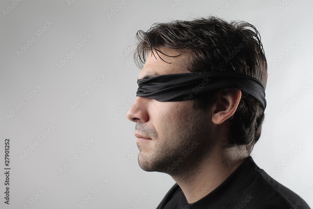 Blindfolded man Blindfolded man