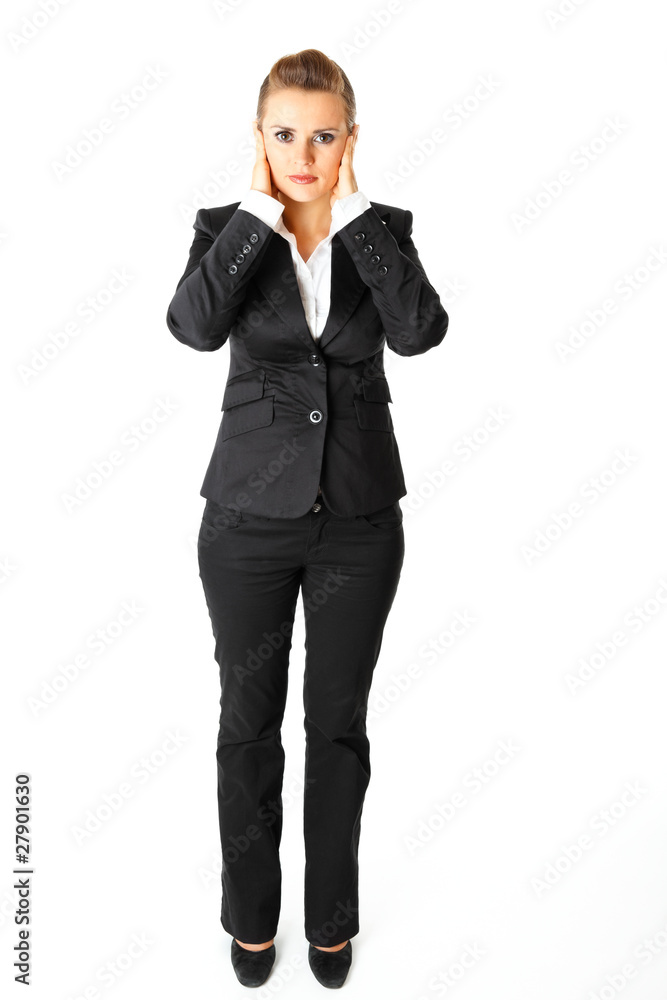 Modern business woman with hand on ears isolated on white. Modern business woman with hand on ears isolated on white.
