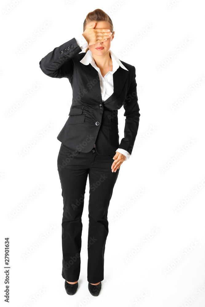 Modern business woman with hand on eyes isolated on white. Modern business woman with hand on eyes isolated on white.