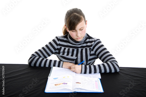 Girl doing homework photo