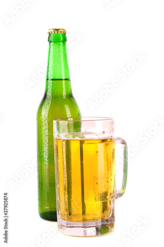 Bottle of beer and cup isolated on white