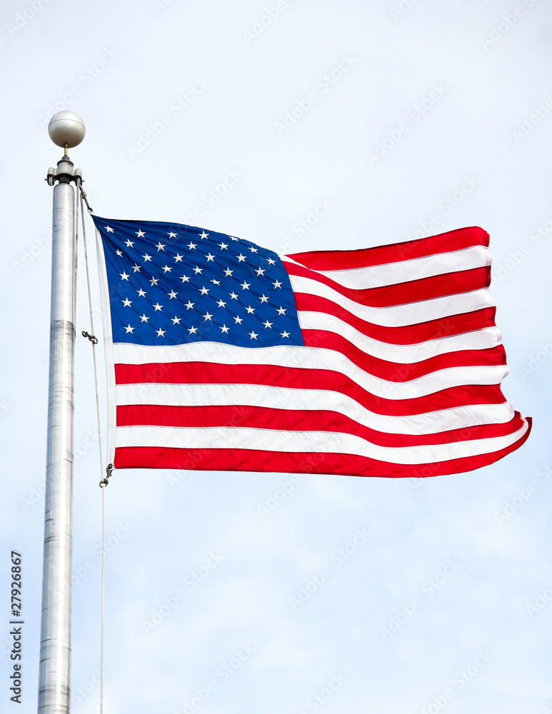 United States Flag Waving In Wind On Flag Pole