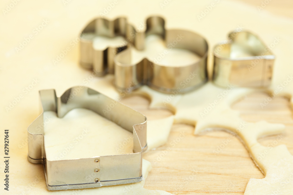 cut dough snowman, house, heart, and forms for cookies cut dough snowman, house, heart, and forms for cookies
