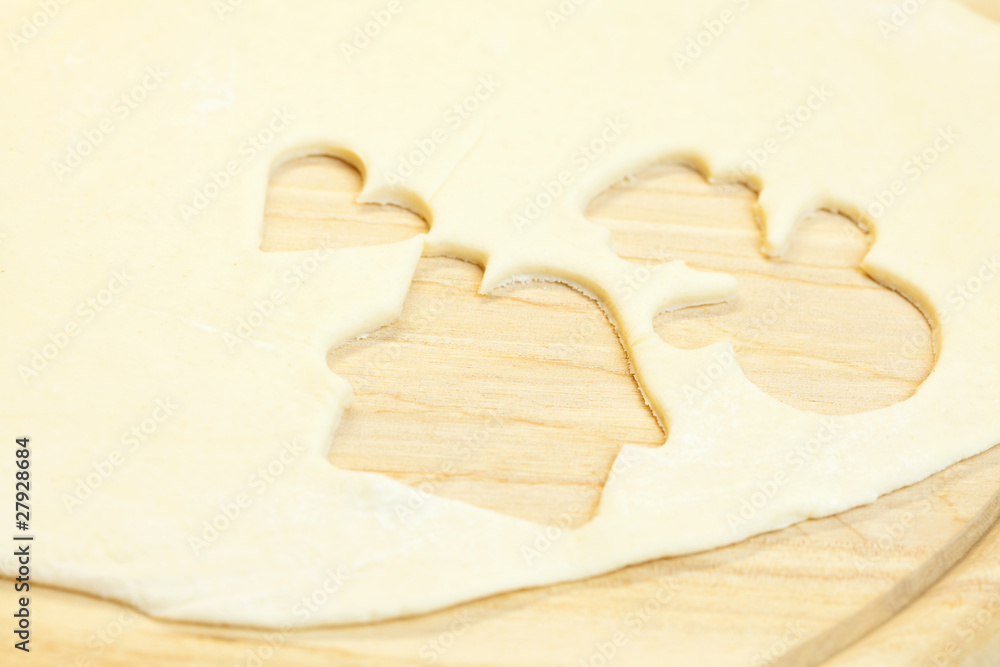 cut in the dough snowman, heart, and house cut in the dough snowman, heart, and house