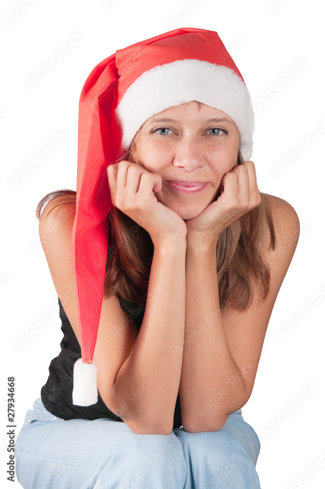 The girl in a red Santa's cap The girl in a red Santa's cap