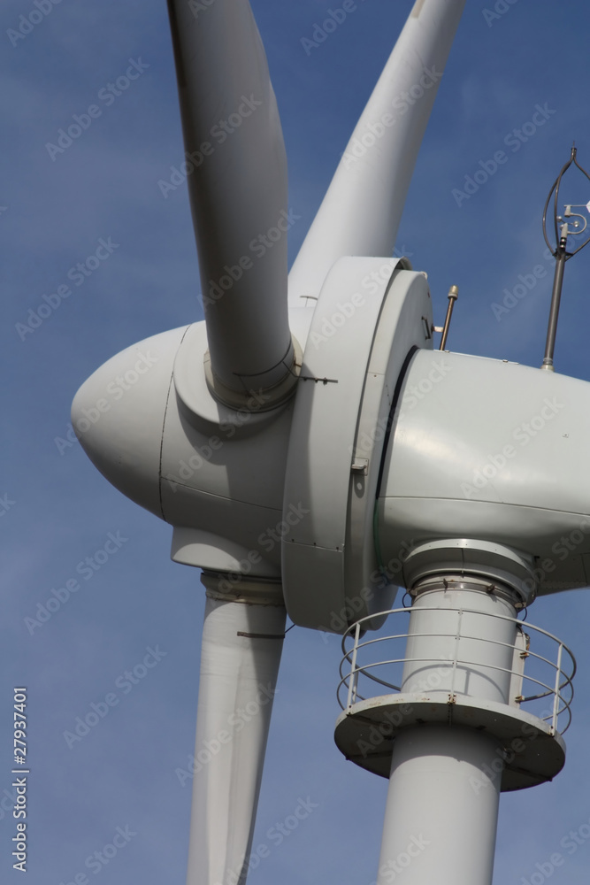 Wind farm turbines against the blue sky Wind farm turbines against the blue sky