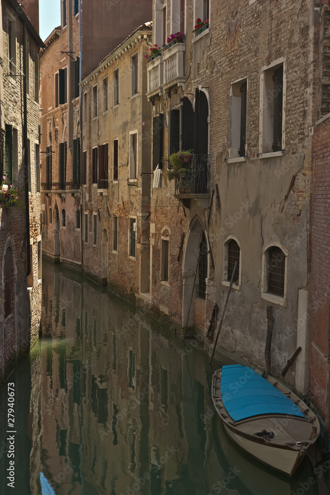 Venice canal with boat