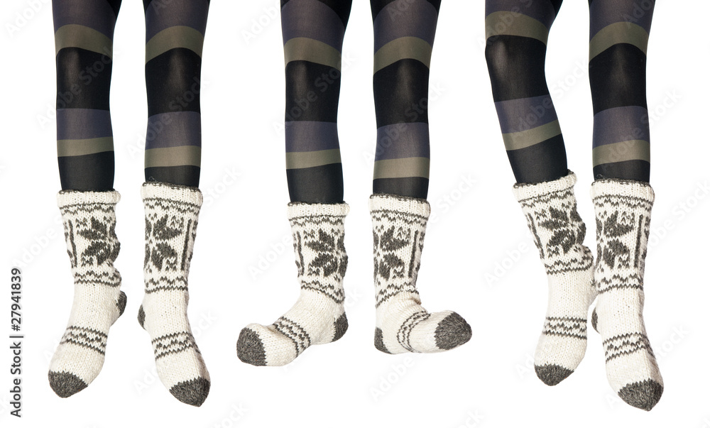 Studio photo of the female legs in colorful tights