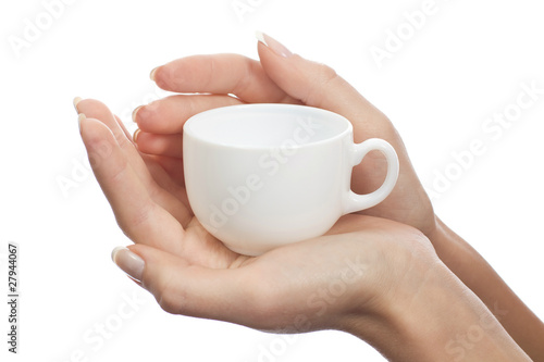 Coffee cup in female hands