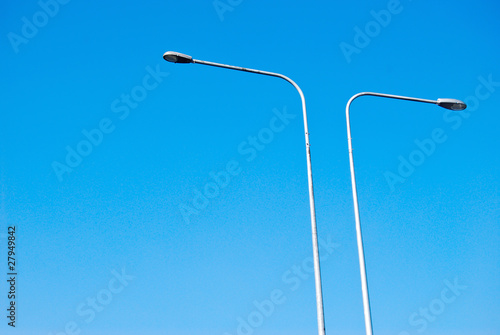 electricity lamp post on the blue sky