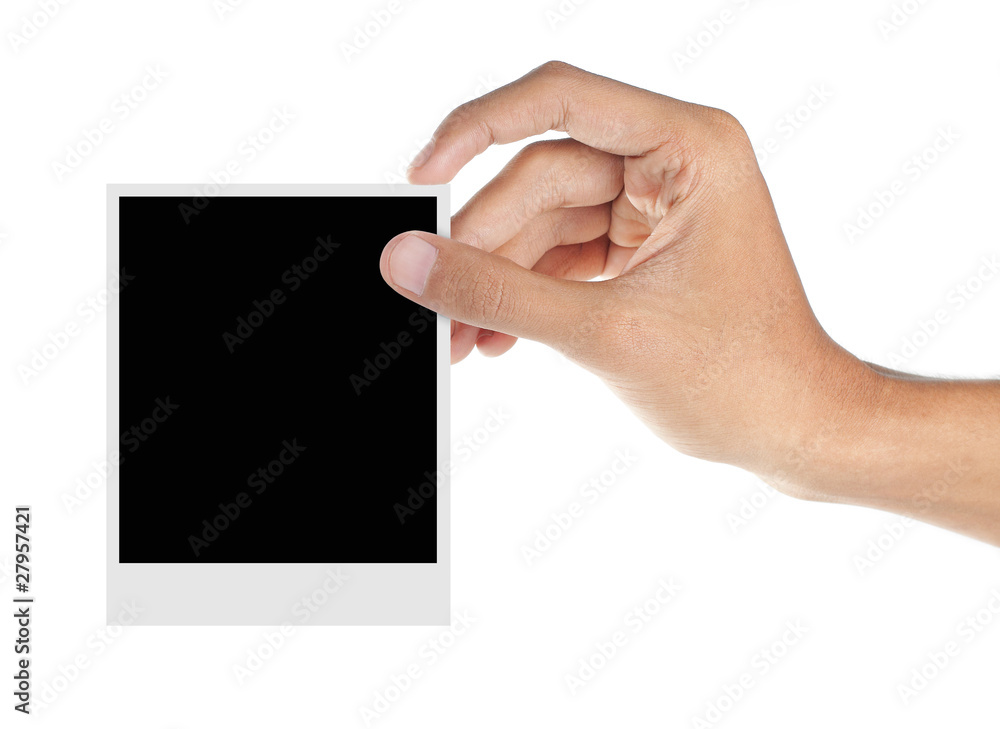 Obraz premium hand holding a blank photo frame