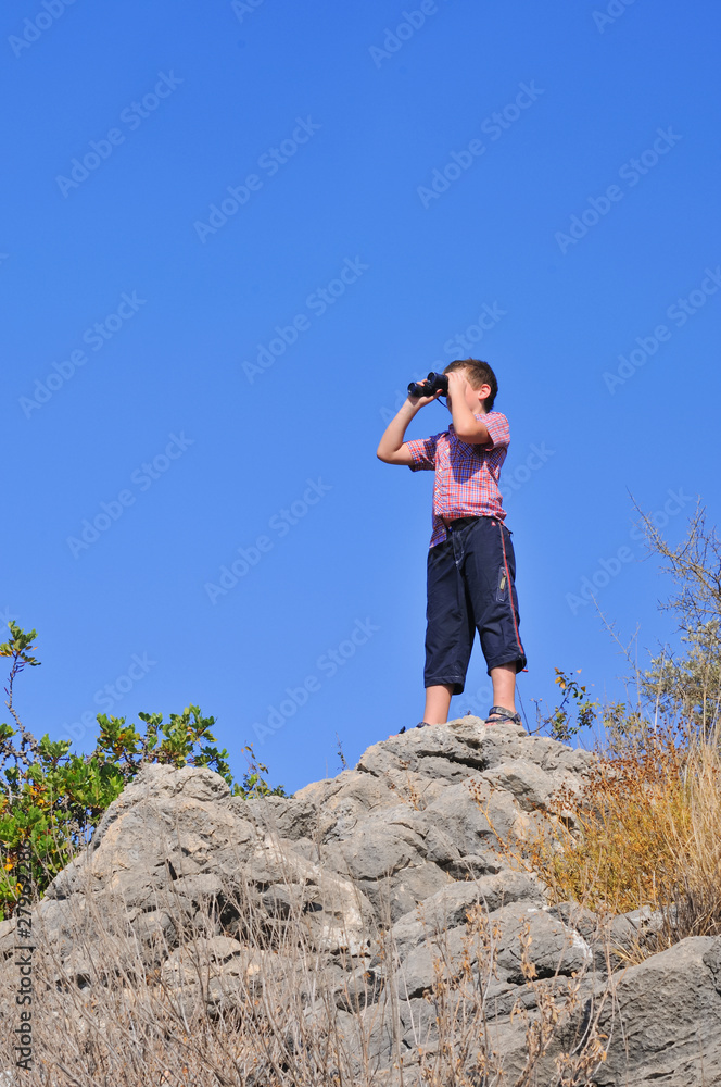 Boy with binoculars