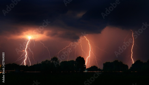 Thunderstorm in the field. Triple blow #27964080
