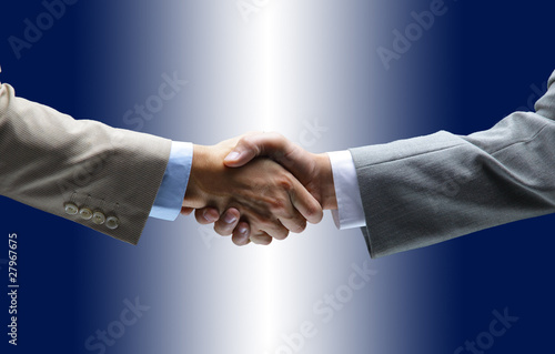 handshake isolated on blue background