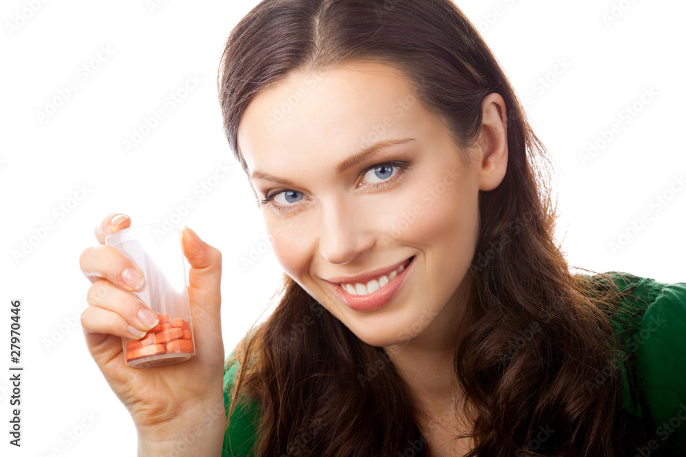 Portrait of smiling woman showing bottle with pills, isolated Portrait of smiling woman showing bottle with pills, isolated