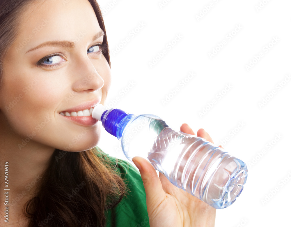 Woman drinking water from bottle, isolated on white Woman drinking water from bottle, isolated on white