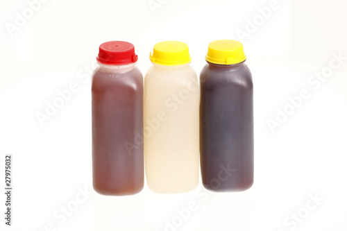Assorted bottles with fresh juice