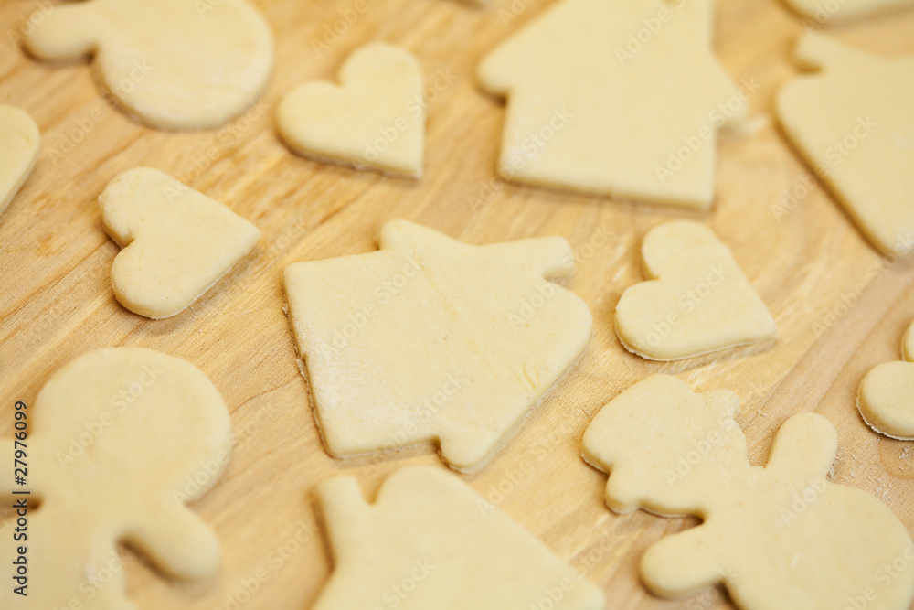 cut in the dough snowman, heart, and house cut in the dough snowman, heart, and house
