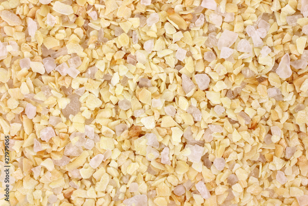 Very close view of garlic flakes with sea salt Very close view of garlic flakes with sea salt