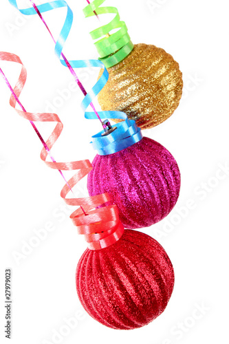 Christmas balls hanging with ribbons isolated on white