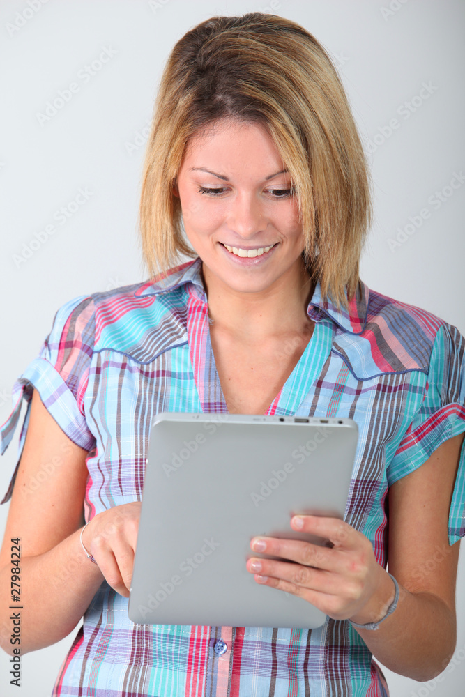 Young woman with electronic pad Young woman with electronic pad