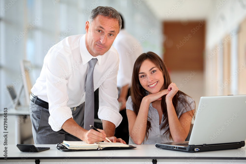 Fototapeta premium Manager and secretary working in the office