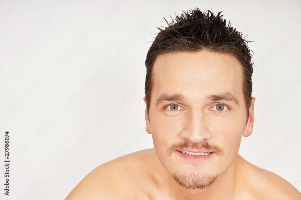 Face of young happy man. You can write text on left side. Face of young happy man. You can write text on left side.