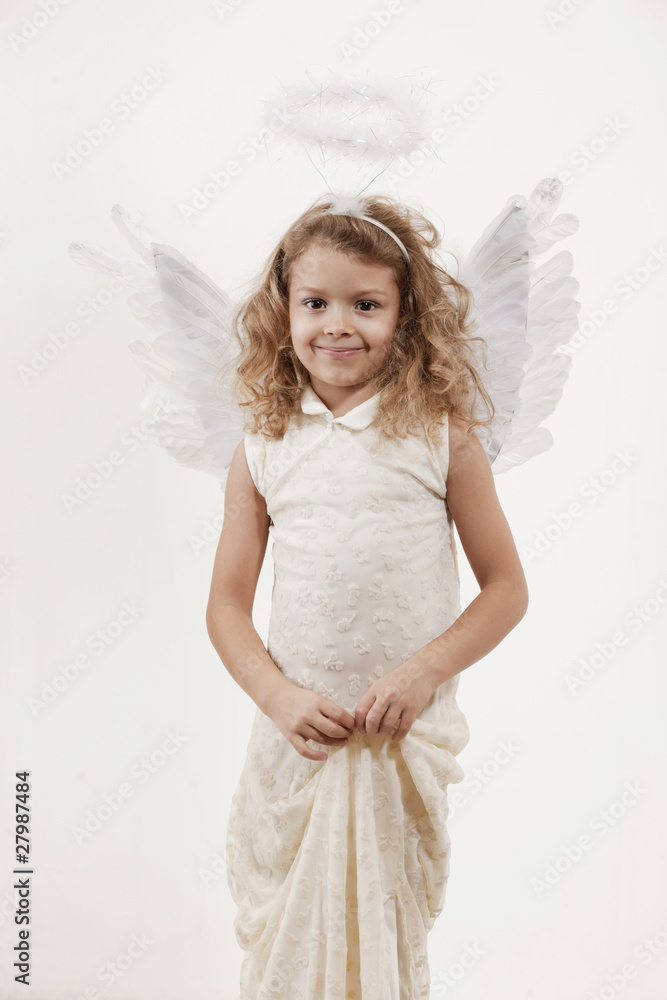 Girl with angel wings in studio Girl with angel wings in studio