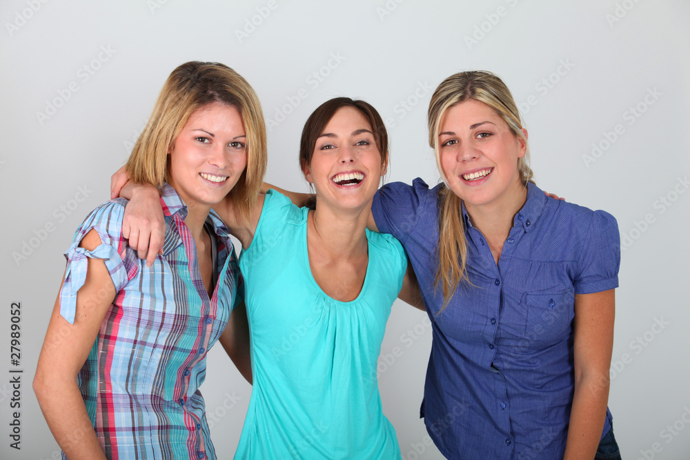 Closeup of 3 young women on white background Closeup of 3 young women on white background