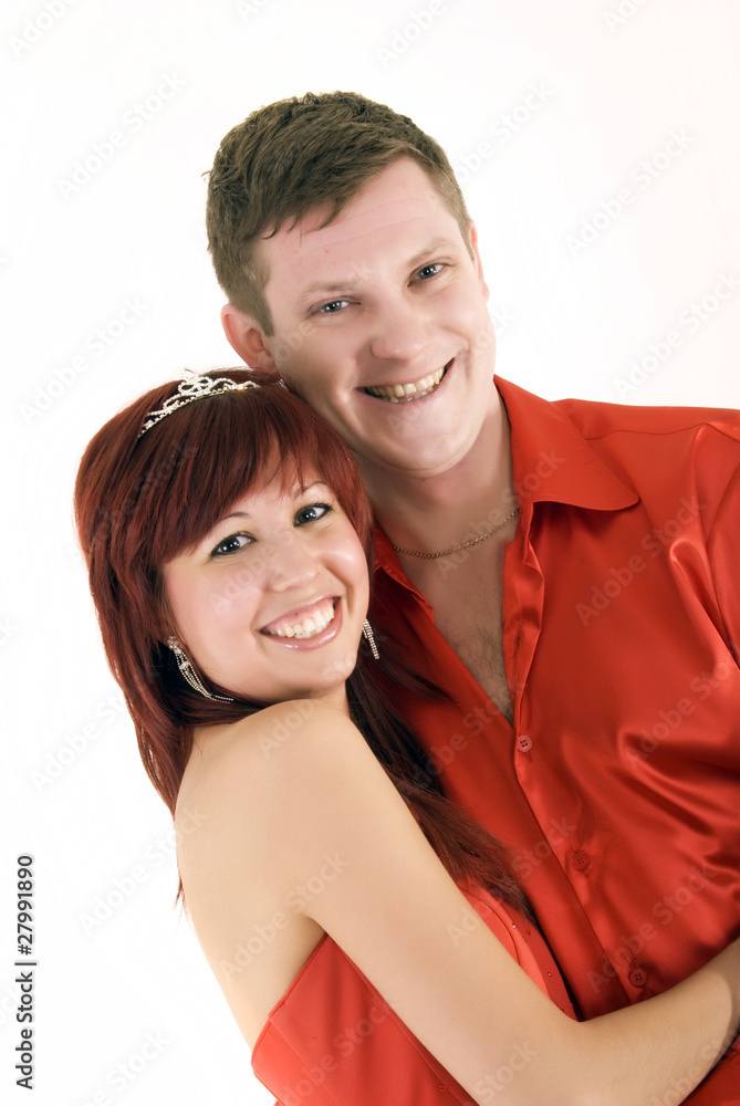 Young couple in red as a concept of love and passion Young couple in red as a concept of love and passion