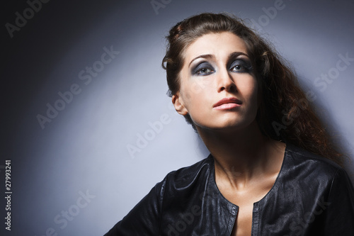 studio portrait of pretty fashionable girl